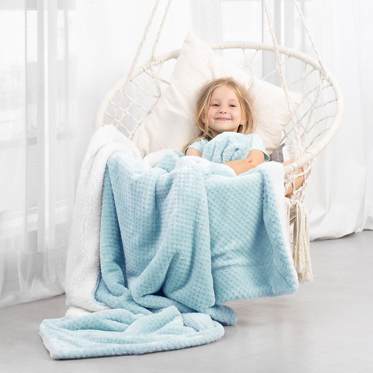 Coperta SHLEEPY colore azzurro chiaro motivo jacquard stile classico 70x150