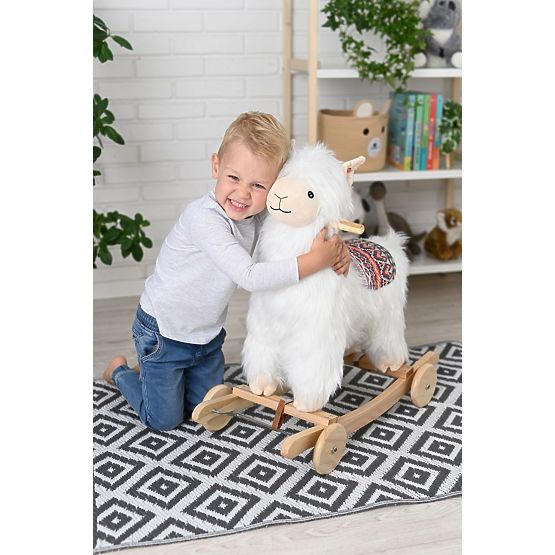 Alpaca su cavallo a dondolo con ruote