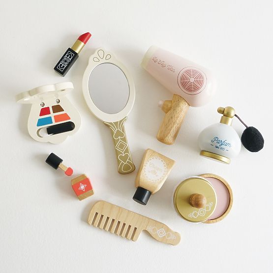 Borsa cosmetica con accessori in legno