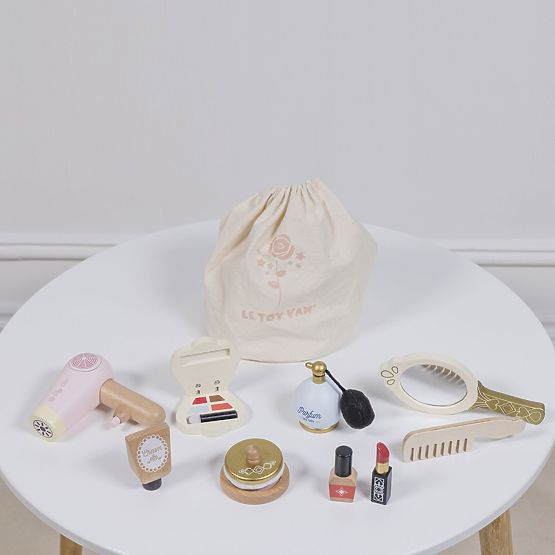 Borsa cosmetica con accessori in legno
