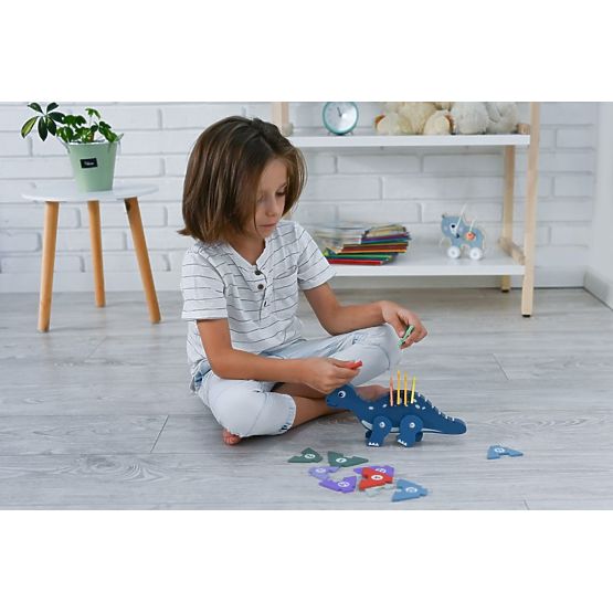 Dinosauro con puzzle numerici
