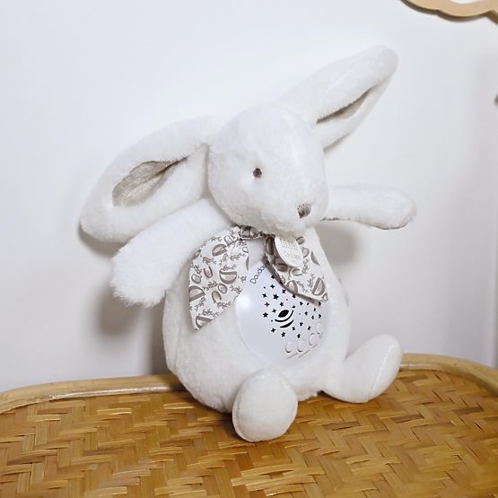 Doudou Carillon con proiezione Coniglietto bianco