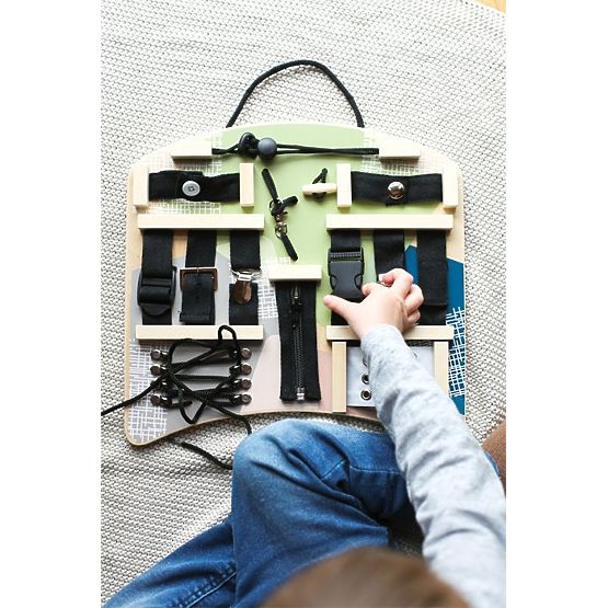 Lavagna educativa con fibbie, clip e lacci