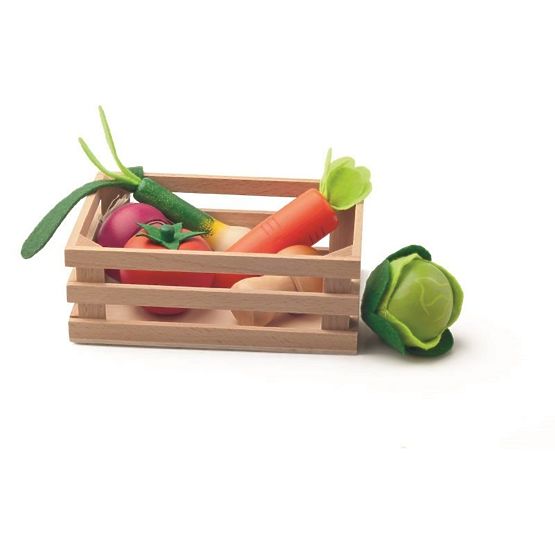 Verdure in legno in una cassa