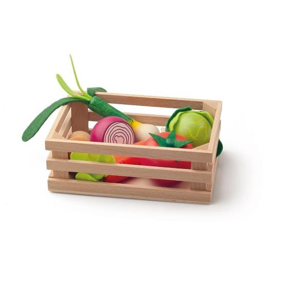 Verdure in legno in una cassa